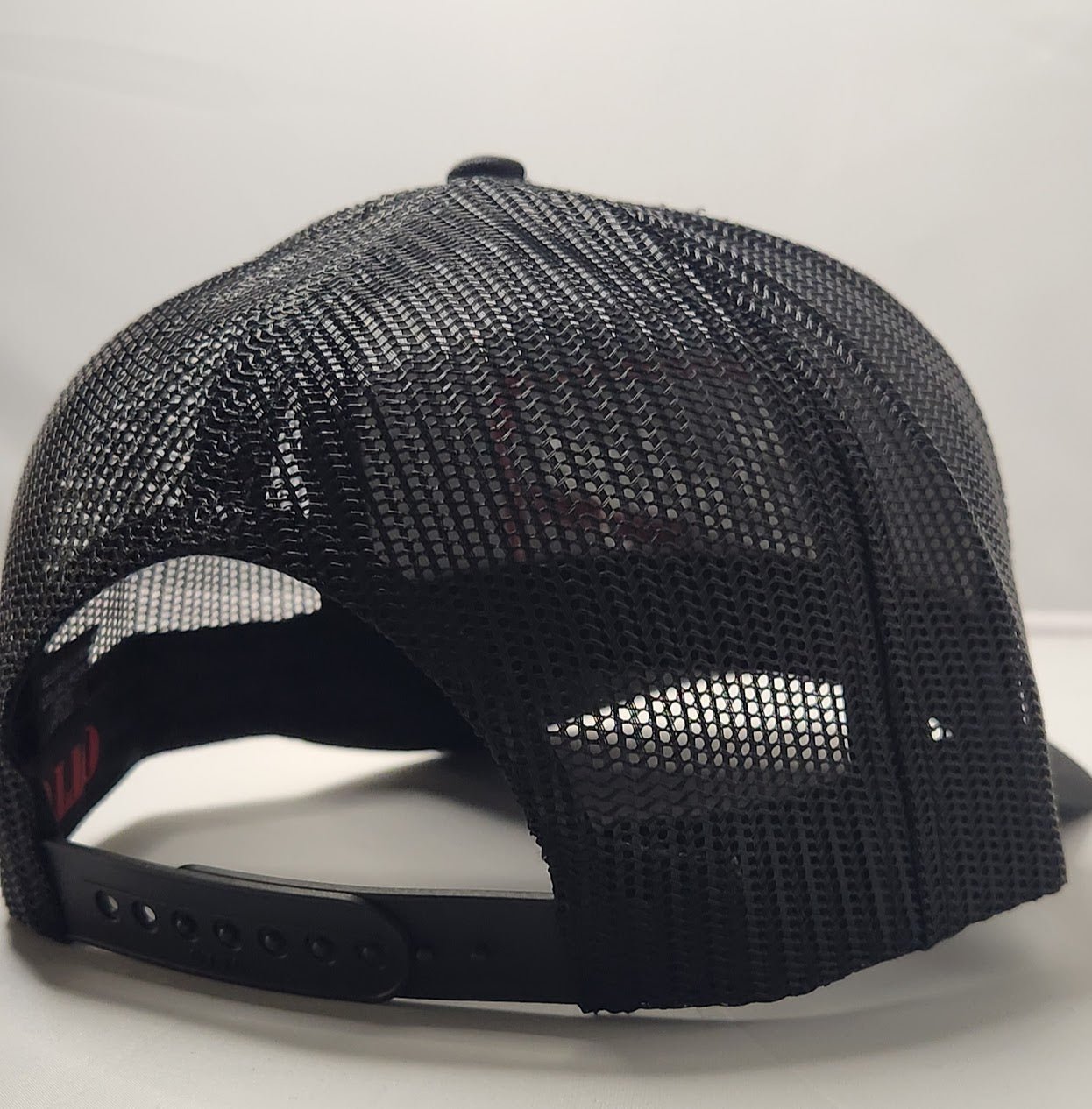 The Lodge Black & Red Trucker Hat - LMG Shop